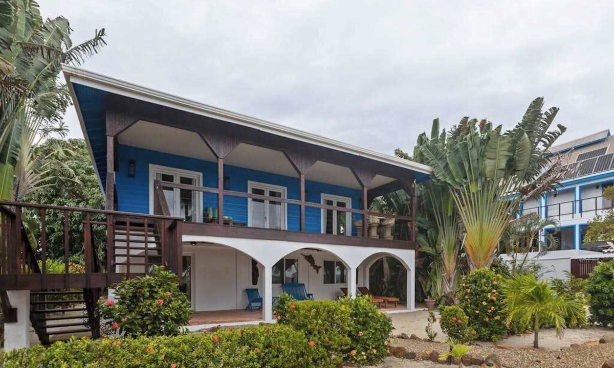 Caribbean Way House | Beachfront home with dock, deck, hammocks, strong WiFi, AC & sea view