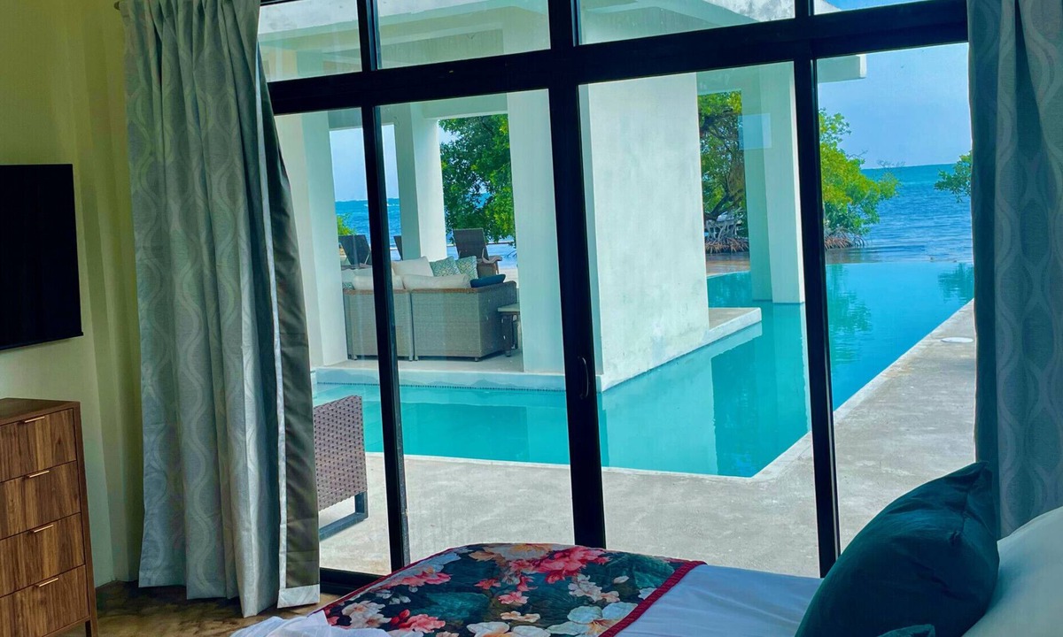 San Pedro Villa | Beachfront Villa Events Celebrations Groups @ 7BR Private Beach, Huge Pool Pier