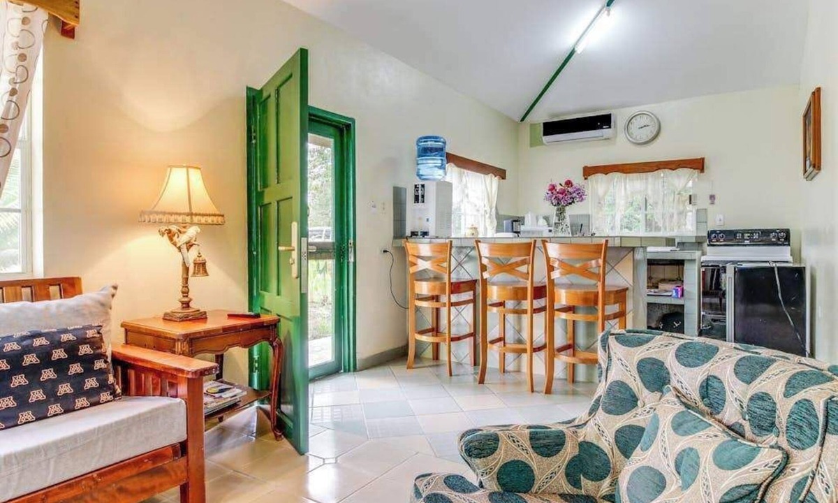San Ignacio House | Charming Home w Central AC, Shared Pool, & Garden- Day Trip Opportunities