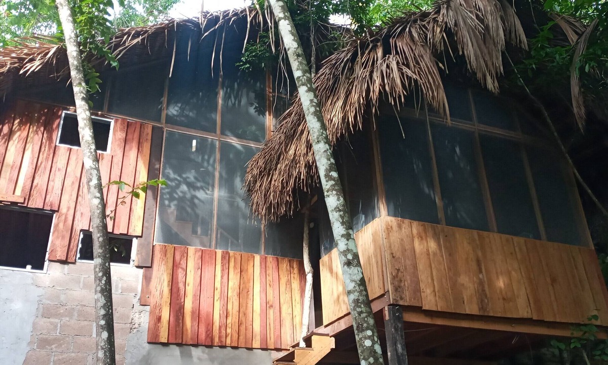Armenia Apartment | Maya Cave House. Overnite in a cave in Belize, with howler monkeys as neighbours