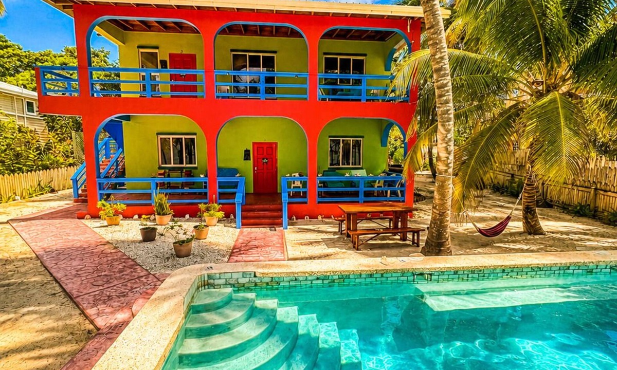 San Pedro Condo | Oceanfront 2BR/2BA Condo with Huge Pool, Private Dock, Beach & Reef Views