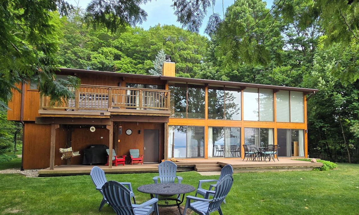 Suttons Bay House | Private Lakefront Suttons Bay Home with Hot Tub, Newly Renovated Beach and A/C!