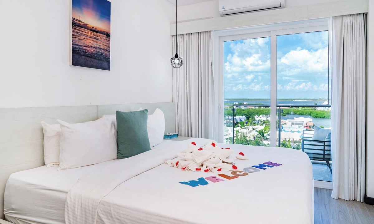 San Pedro Hotel | Sunset Unit 516 Lagoon-View | Balcony | Watermark