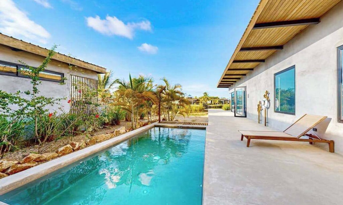 Placencia Villa | Waterfront villa with private pool, furnished deck & gas grill