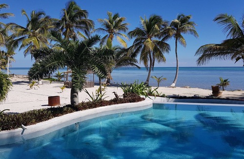 San Pedro Condo | 206 Luxury 3rd floor 2 bd 2 bath beachfront condo with stunning pool and views!