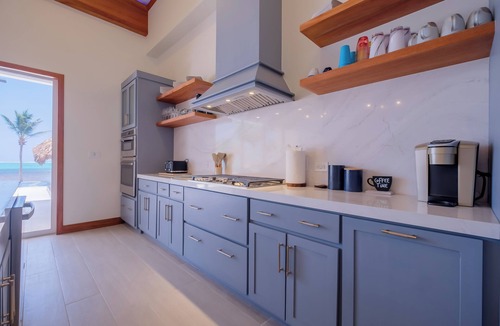 San Pedro House | 4BR NEW Oceanfront Luxury, Steps Into the Caribbean, Private Pier & Rooftop