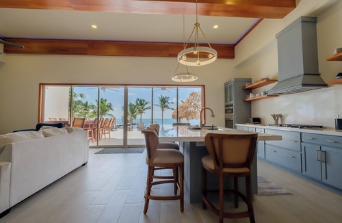 San Pedro House | 4BR NEW Oceanfront Luxury, Steps Into the Caribbean, Private Pier & Rooftop