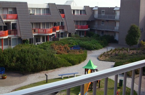 Buren Apartment | Ameland - apartment with balcony to the south side with a view of meadows and the village of Buren