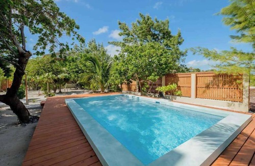 Caye Caulker House | Beachfront abode with well-equipped kitchen - pool, beach, grill, & canoe access