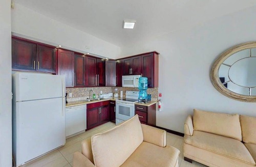 San Pedro Condo | Beachfront condo with ocean views, WiFi, partial AC & shared pool/dock/kayaks