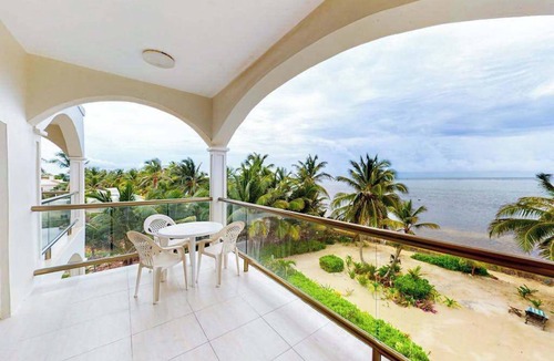 San Pedro Condo | Beachfront condo with ocean views, WiFi, partial AC & shared pool/dock/kayaks