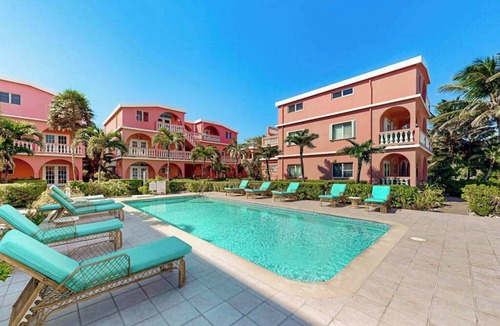 San Pedro Condo | Beachfront dog-friendly condo with pool - walk to ocean from the veranda