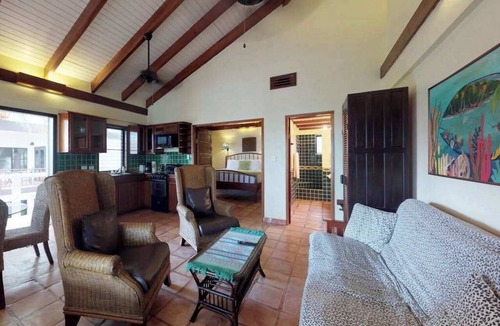 Placencia Condo | Beachfront, ocean-view getaway with shared pool, hammock, WiFi, & central AC