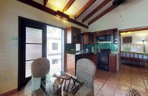 Placencia Condo | Beachfront, ocean-view getaway with shared pool, hammock, WiFi, & central AC