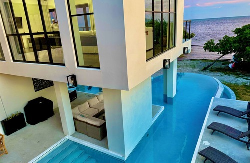 San Pedro Villa | Beachfront Villa Events Celebrations Groups @ 7BR Private Beach, Huge Pool Pier