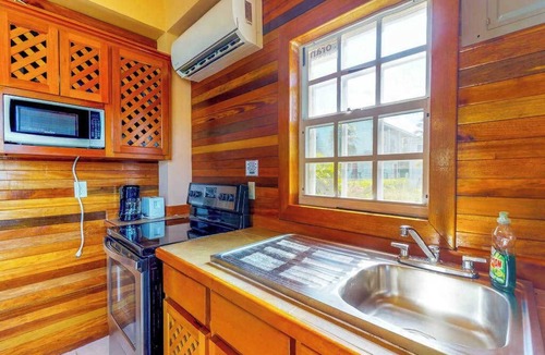 Caye Caulker Cabin | Breezy Modern Home in Quiet Neighborhood with Bikes, WiFi, and Partial AC