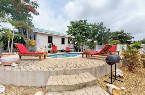Hopkins House | Charming cabana with a porch, hammock, strong WiFi, and a shared pool & grill