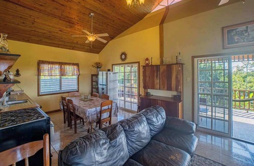 San Antonio Cabin | Charming cabin with private balcony, lush views & eco-friendly features