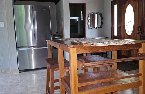 San Ignacio House | Enchanting Riverside Jungle Village Bungalow: Pool, A/C, WiFi, TV, Kayaks & More