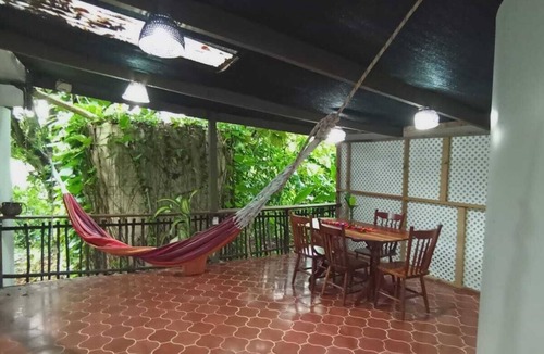 San Ignacio Apartment | Experience comfort and relaxation in our air-conditioned apartment, featuring two spacious bedrooms, a welcoming living room, a fully equipped private kitchen, and a well-appointed private bathroom. Perfect for families or groups.