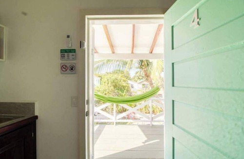 Caye Caulker Apartment | Island studio centrally located with balcony, hammock, & grill