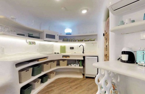 Cocoplum Villa | Lagoon view retreat villa with pool, private hot tub, & AC