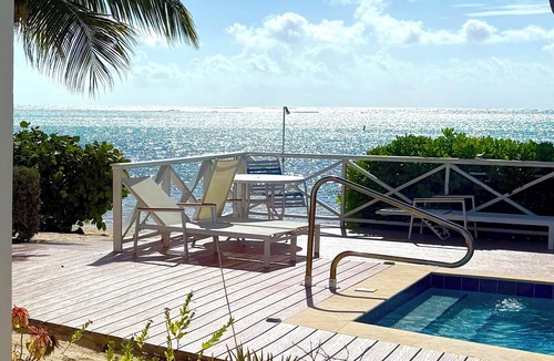 Blossom Village Condo | Little Cayman Time - CC 18 - Beachfront 2-bedroom Condo w/2 pools and Jacuzzi