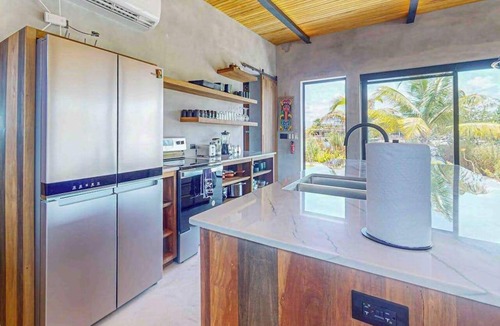 Placencia Villa | Luxury water view villa with splash pool, high speed WiFi & dog-friendly vibes