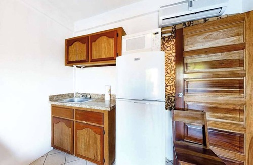 Caye Caulker Condo | Multi-Suite Family Property with Private Pool, Ocean Views, WiFi, and Partial AC