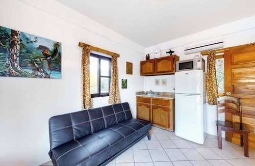 Caye Caulker Condo | Multi-Suite Family Property with Private Pool, Ocean Views, WiFi, and Partial AC