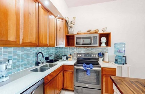 San Pedro Condo | New oceanfront condo w/shared pool, dock, two kayaks, partial AC, strong WiFi