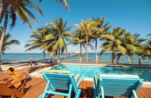 Placencia Condo | Ocean view condo at beachfront complex with AC, free WiFi, & pool
