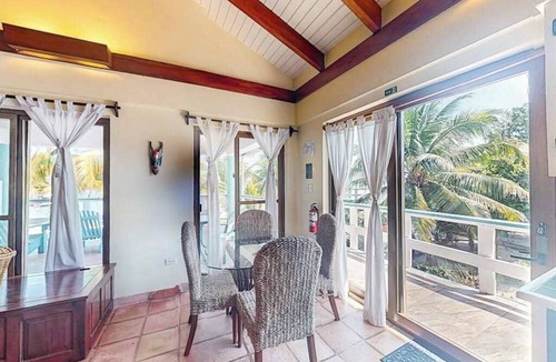 Placencia Condo | Ocean view condo at beachfront complex with AC, free WiFi, & pool