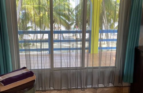 San Pedro Condo | Oceanfront 2BR/2BA Condo with Huge Pool, Private Dock, Beach & Reef Views