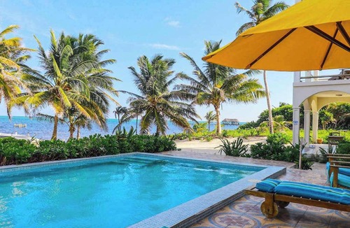 San Pedro Condo | Oceanfront apartment on the beach with great ocean views, pool, WiFi & AC