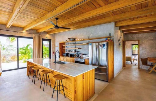 Placencia Villa | Relaxing tropical villa with private plunge pool, open layout & canal water view