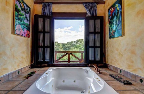 Bullet Tree Falls Apartment | Riverfront Retreat with Balcony, WiFi, Partial AC, Shared Pool