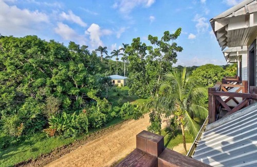 Bullet Tree Falls Apartment | Riverfront Retreat with Balcony, WiFi, Partial AC, Shared Pool