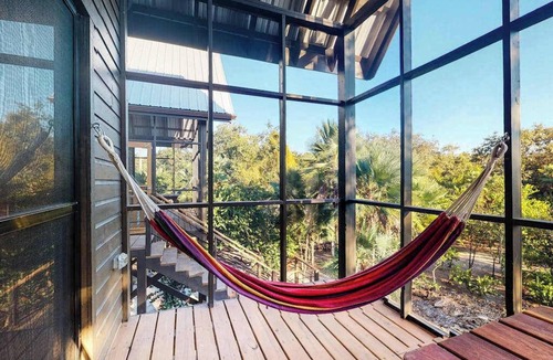 Surfside Cabin | Romantic cabana with veranda, hammock, partial AC & WiFi - walk to the beach