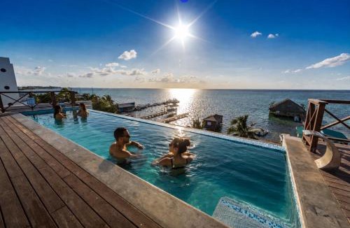 San Pedro Hostel | Sandbar Beachfront Hotel & Hostel Restaurant
