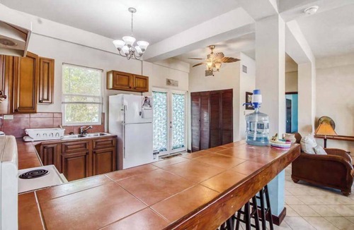San Pedro Condo | Sea-view, dog-friendly condo with pool & central AC- between the beach & lagoon