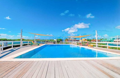 San Pedro Condo | Sea-view, dog-friendly condo with pool & central AC- between the beach & lagoon