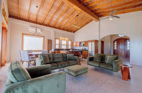 Caye Caulker Apartment | Spacious beachfront retreat with a soaking tub - pool, canoes, dock, & grill