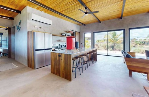 Placencia Villa | Spacious dog-friendly villa with king beds, private pool, water views & BBQ deck
