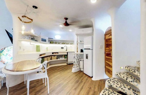 Cocoplum Villa | Stunning lagoon-front villa with pool, private hot tub, & AC