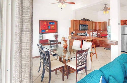 San Pedro Condo | Stylish condo near the beach with pool, fast WiFi, partial ocean views & AC