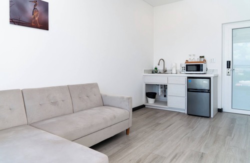 San Pedro Hotel | Sunset Suite 501 | Lagoon-View 1BR with Balcony at The Watermark Hotel