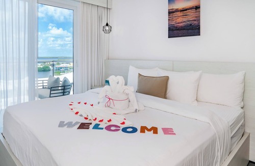 San Pedro Hotel | Sunset Unit 515 Lagoon-View | Balcony | Watermark