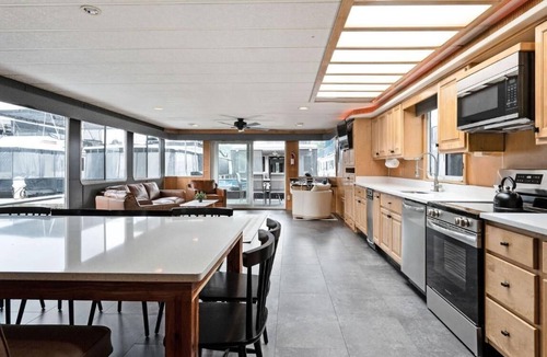 Allons Boat Rental | The Flagship Houseboat 84' - Largest Houseboat, 6 bedrooms,waterslide, fireplace on rooftop lounge area