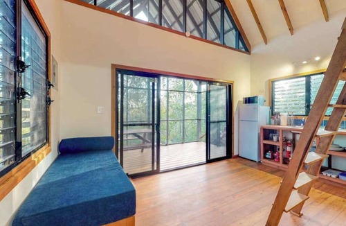 Surfside Cabin | Three forest cabanas with verandas, hammocks, WiFi & partial AC - walk to beach